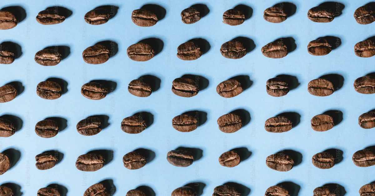 Coffee beans with light blue background
